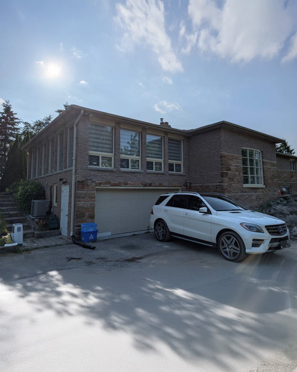 Brick home before masonry staining