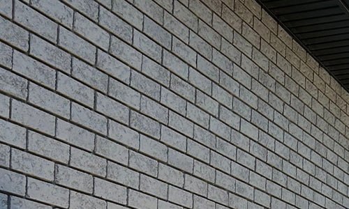 Close-up of natural semi-transparent mineral stained brick